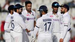 India's Ravichandran Ashwini, centre, celebrates the dismissal of Sri Lanka's Dhananjaya de Silva wi