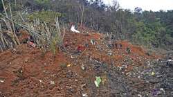 Rescue workers search for the black boxes at a plane crash site in Tengxian county, southwestern China's Guangxi Zhuang Autonomous Region, Tuesday, March 22, 2022.?