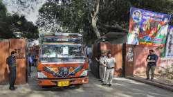 A truck leaves from 12, Janpath, the bungalow allotted to former union minister Ram Vilas Paswan, in New Delhi, Wednesday, March 30, 2022. Directorate of Estates has sent a team to evict Ram Vilas Paswan’s son and MP Chirag Paswan and other residents from the bungalow.