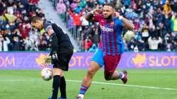 Barcelona striker Memphis Depay celebrates after scoring a penalty against Elche at Estadio Manuel M