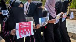 Muslim students wearing burqa protest against the Karnataka High Courts verdict on Hijab by boycotting their internal exams in front of IDSG college, in Chikmagalur, Wednesday, March 16, 2022. 