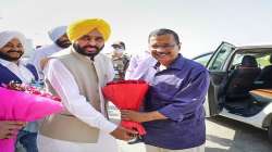 Punjab CM-designate Bhagwant Mann receives AAP national convenor Arvind Kejriwal at Amritsar airport.