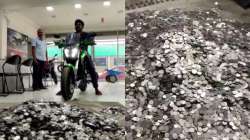 Tamil Nadu's Salem youth collected one rupee coin for three years to buy his dream bike. 