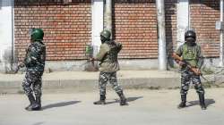 Armed security personnel stand at guard, in Srinagar, Saturday, Feb. 19, 2022.?