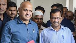 Manish Sisodia with Arvind Kejriwal at Delhi Assembly in New Delhi.