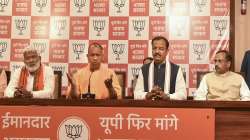 Uttar Pradesh Chief Minister Yogi Adityanath speaks during a press conference for the seventh and last phase of UP Assembly elections at the BJP office, in Lucknow.