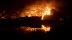 A massive fire which broke out at the Bhalswa landfill site in north Delhi, Tuesday, April 26, 2022.