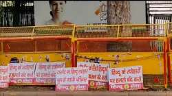 Hindu Sena puts up posters outside Congress Headquarters.