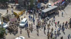 Security personnel keep vigil after clashes broke out between two communities during a Hanuman Jayanti procession on Saturday, at Jahangirpuri in New Delhi, Sunday, April 17, 2022.