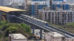 A metro train runs on Mumbai Metros 2A line.