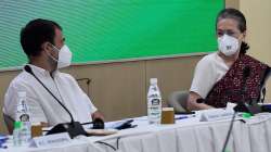 Congress interim president Sonia Gandhi with party leader Rahul Gandhi during the Congress Working Committee (CWC) meeting at AICC headquarters in New Delhi, Saturday, Oct. 16, 2021.