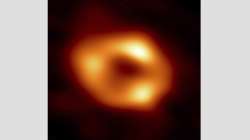 This image released by the Event Horizon Telescope Collaboration, Thursday, May 12, 2022, shows a black hole at the center of our Milky Way galaxy. The Milky Way black hole is called Sagittarius A*, near the border of Sagittarius and Scorpius constellations. It is 4 million times more massive than our sun. The image was made by eight synchronized radio telescopes around the world.