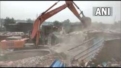 bulldozer, Chandigarh, demolition drive, Chandigarh colony No 4, Chandigarh bulldozer