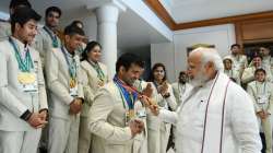 Modi felicitated the Indian Deaflympics contingent at his residence following a historic outing. 