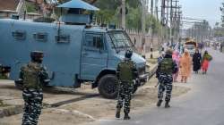 Security personnel patrol to maintain law and order, in Srinagar, Tuesday, May 3, 2022.