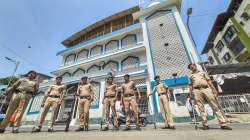 Police personnel stand guard outside a mosque after MNS called for agitation outside mosques, at Rabodi in Thane, Wednesday, May 4, 2022.