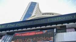  
A screen displays Sensex crossing record 60,000 mark for the first time at BSE building, in Mumbai, Friday, Sept. 24, 2021. 