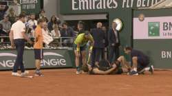 Alexander Zverev being attented to after ankle injury