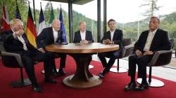 G7 leaders from left, British Prime Minister Boris Johnson, U.S. President Joe Biden, German Chancellor Olaf Scholz, French President Emmanuel Macron and Italy's Prime Minister Mario Draghi meet on the sidelines of the G7 summit at Castle Elmau in Kruen, near Garmisch-Partenkirchen, Germany