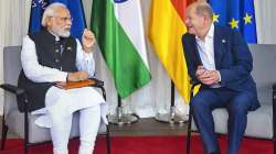 Prime Minister Narendra Modi interacts with Chancellor of Germany Olaf Scholz during a meeting on the sidelines of G7 Summit, in Germany.