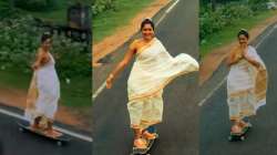 Woman skateboarding in saree