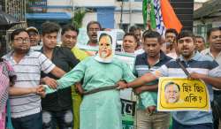 Nadia: Congress workers stage a protest demanding action against TMC leader Partha Chatterjee, after he was arrested in the SSC scam case
