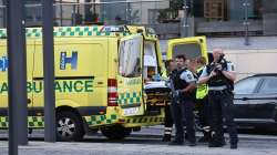 An ambulance and armed police outside the Field's shopping center, in Orestad