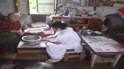 CM Mamata Banerjee makes momos during her visit to Darjeeling.