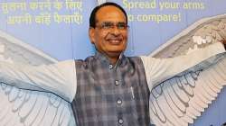 Madhya Pradesh Chief Minister Shivraj Singh Chouhan poses for a photograph during his visit to Jal Tarang, on World Environment Day, in Bhopal, Sunday, June 5, 2022