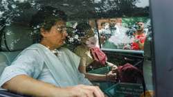 Congress Chief Sonia Gandhi with party General Secretary Priyanka Gandhi Vadra leaves after appearing before the Enforcement Directorate for questioning in connection with the National Herald case, in New Delhi