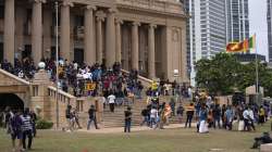 Protesters walk around and spend time a day after storming into the president's office at the ongoing protest site in Colombo, Sri Lanka on Sunday, July 10.