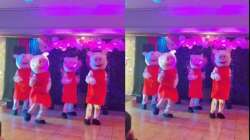 A group of Peppa pigs dancing to Kala Chasma