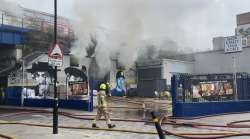 Major fire breaks out in central London railway arch, trains halted