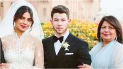 Priyanka Chopra, Nick Jonas and Madhu Chopra