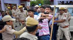 Police personnel lathi-charge to disperse students who created a ruckus during filing of nominations for students union elections of Rajasthan University