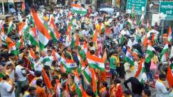 People participate in a Tiranga Yatra organised as part of Azadi Ka Amrit Mahotsav celebrations.