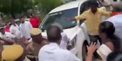 Thiaga Rajan was leaving the airport when some suspected BJP workers blocked his car, even as a slipper hurled at the vehicle got stuck in its wind screen.

