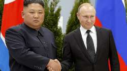 FILE - Russian President Vladimir Putin, right, and North Korea's leader Kim Jong Un shake hands during their meeting in Vladivostok, Russia, April 25, 2019.