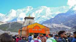 Devotees during the opening of the doors of the Kedarnath Temple, in Rudraprayag district.