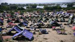 Temporary housing is constructed for flood victims, in Sehwan, Sindh province, Pakistan, Friday, Sept. 9, 2022.