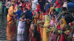 People perform the Chhath Puja. 