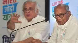 Senior Congress leaders Digvijaya Singh and Jairam Ramesh address a press conference regarding the Bharat Jodo Yatra, in New Delhi.