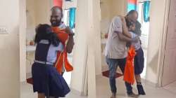 Father surprises daughter with his new job