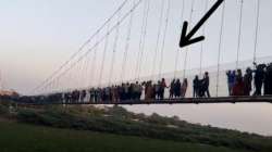 People trying to swing the Morbi cable bridge in Gujarat