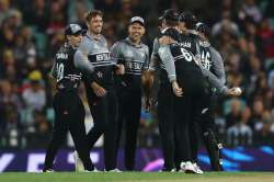 Tim Southee celebrating a wicket with his teammates.