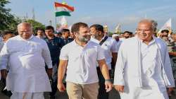 Congress leader Rahul Gandhi with party leaders Mallikarjun Kharge and Bhupesh Baghel during the party's 'Bharat Jodo Yatra', in Ballari.