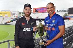 Kane Williamson and Shikhar Dhawan pose with the ODI trophy.