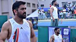 MS Dhoni flaunts biceps while playing Tennis