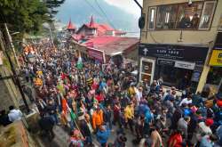 Congress supporters during an election campaign rally ahead of Himachal Pradesh Assembly elections, at Mall Road in Shimla.