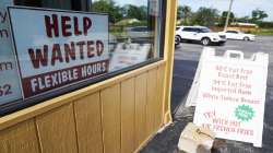 A help wanted sign is displayed in Deerfield, Ill., Wednesday, Sept. 21, 2022. 